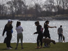 People enjoying the warm weather in the Humber Bay Shores ares in Toronto, Ont. on Saturday April 10, 2021. Ernest Doroszuk/Toronto Sun/Postmedia