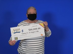 (Tammy Messina, 63, of Niagara Falls won $500,000 with the Bigger Spin Instant Game.