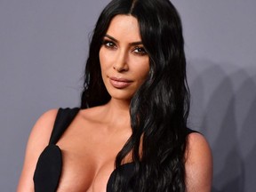 In this file photo taken on February 6, 2019, US media personality Kim Kardashian West arrives to attend the amfAR Gala in New York.