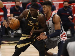 Toronto Raptors forward Pascal Siakam drives to the basket as Washington Wizards center Daniel Gafford defends during the second half at Amalie Arena.