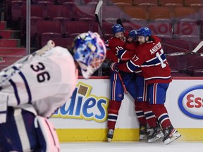 Montreal Canadiens forward Jesperi Kotkaniemi reacts with teammates after scoring the winning goal against Toronto Maple Leafs goalie Jack Campbell during the overtime period on May 29, 2021, at the Bell Centre.