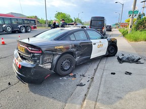 A damaged police car near Gordon MacKay Rd. and Suntract Rd. after it was rammed by a fleeing vehicle juts after 4 a.m. on Wednesday, May 26 2021.