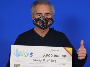 George Barber, of Tiny Township, Ont., with his lotto win.