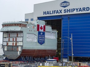 The centre block of the future HMCS Max Bernays is moved from the fabrication building to dockside at the Irving Shipbuilding facility in Halifax on Friday, Jan. 22, 2021.The vessel is Canada's third Arctic and Offshore Patrol Ship (AOPS) being built for the Royal Canadian Navy. The vessel is named for Max Bernays, who fought in the Battle of the Atlantic during the Second World War.