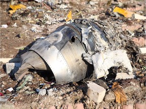 Debris of a plane belonging to Ukraine International Airlines, that crashed after taking off from Iran's Imam Khomeini airport, is seen on the outskirts of Tehran, Iran, Jan. 8, 2020.