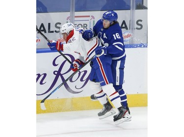 Toronto Maple Leafs Mitch Marner RW (16) hits Montreal Canadiens Artturi Lehkonen RW (62) during second period action in Toronto on Thursday May 6, 2021. Jack Boland/Toronto Sun/Postmedia Network