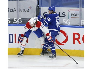 Montreal Canadiens Josh Anderson RW (17) bangs into Toronto Maple Leafs Mitch Marner RW (16) during second period action in Toronto on Thursday May 6, 2021. Jack Boland/Toronto Sun/Postmedia Network