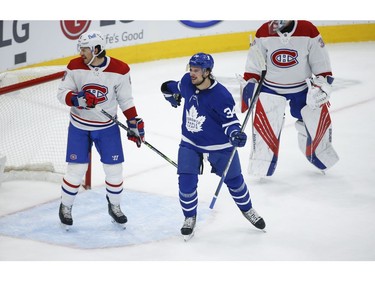 Toronto Maple Leafs Auston Matthews C (34) points to the net and teammate Mitch Marner's goal during first period action in Toronto on Thursday May 6, 2021. Jack Boland/Toronto Sun/Postmedia Network