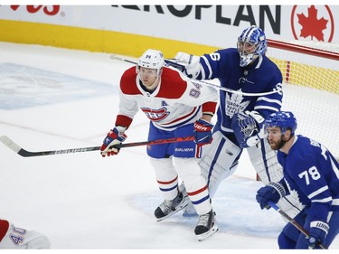Montreal Canadiens Corey Perry LW (94) and Toronto Maple Leafs Jack Campbell G (36) get into it in front of the net during first period action in Toronto on Thursday May 6, 2021. Jack Boland/Toronto Sun/Postmedia Network