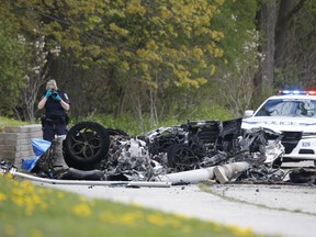 Peel Regional Police investigate after two people were killed when their Ferrari lost control on a section of Burhamthorpe Rd. W. near Promontory Rd. in Mississauga on Saturday, May 8, 2021.