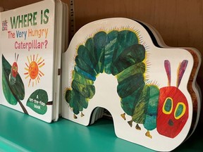 Copies of "The Very Hungry Caterpillar," by acclaimed children's author and illustrator Eric Carle, who publisher Penguin Kids said has died at age 91, are seen in a bookstore in Encinitas, California, U.S., May 26, 2021.