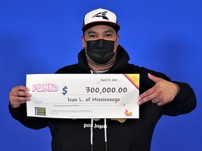 Ivan Limon of Mississauga with his $300,000 lotto win.