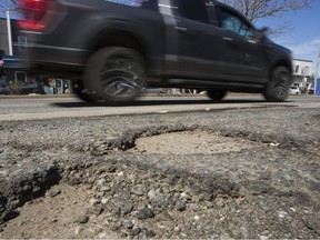 Potholes along Bloor St. W., near Royal York Rd. in Toronto, Ont. on Saturday May 1, 2021.