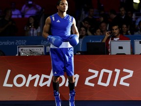 Puerto Rico's Felix Verdejo Sanchez arrives for his quarterfinal Men's Light (60kg) boxing match against Ukraine's Vasyl Lomachenko at the London Olympic Games August 6, 2012.