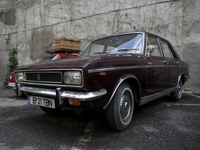 The Paykan Hillman-Hunter limousine, received by late Romania's communist dictator Nicolae Ceausescu in 1974 as a gift from Shad Mohammad Reza Pahlavi, is parked in the courtyard of Artmark auction house, in Bucharest, Romania, May 25, 2021.