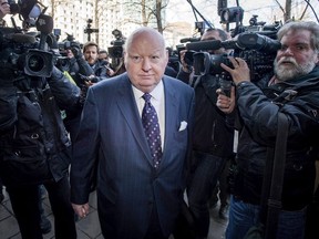 Suspended senator Mike Duffy arrives for his first court appearance at the courthouse in Ottawa on Tuesday, April 7, 2015.