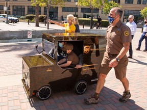 Mateo Toscano, 6, , who is battling leukemia, recently had his wish come true was he was able to become a UPS driver for a day in Stockton, California.