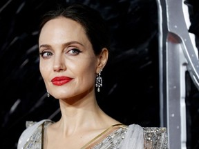 Actor Angelina Jolie poses as she attends the U.K. premiere of “Maleficent: Mistress of Evil” in London, Oct. 9, 2019.