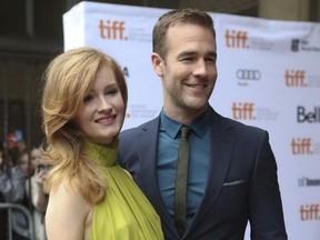 Actor James Van Der Beek (R) and his wife Kimberly  are all smiles f as they arrive for Labor Day at the Ryerson theatre.