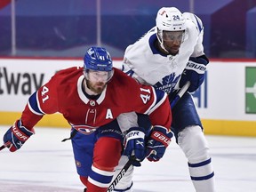 Paul Byron (left) of the Montreal Canadiens skates against the Leafs' Wayne Simmonds of the Toronto Maple during their first-round series.
