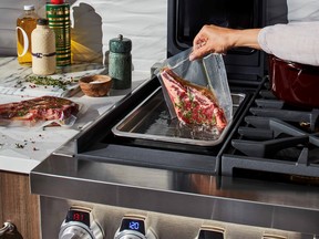 A sous vide is built right into this cooktop. In this cooking technique, food is vacuum sealed and then submerged in water and slow cooked at a lower temperature. SUPPLIED