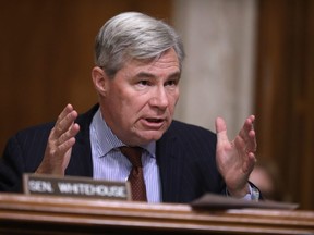 Senate Environment and Public Works Committee member Sen. Sheldon Whitehouse (D-RI) questions Andrew Wheeler during his confirmation hearing to be the next administrator of the Environmental Protection Agency before the  in the Dirksen Senate Office Building on Capitol Hill January 16, 2019 in Washington, DC.