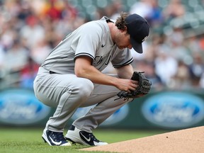 Gerrit Cole of the New York Yankees takes a moment to himself before pitching to the Minnesota Twins in the first inning of the game at Target Field on June 9, 2021 in Minneapolis, Minn.