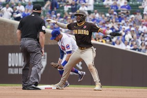 Fernando Tatis Jr. of the San Diego Padres steals second base against Eric Sogard of the Chicago Cubs during the fourth inning of a game at Wrigley Field on May 31, 2021 in Chicago, Illinois. (Nuccio DiNuzzo/Getty Images)