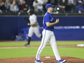 Ross Stripling #48 of the Toronto Blue Jays reacts after a home run by Gary Sanchez #24 of the New York Yankees during the seventh inning at Sahlen Field on June 16, 2021 in Buffalo, New York.