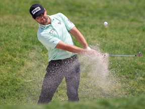 Corey Conners of Canada plays a shot from a bunker on the 16th hole during the first round of the 2021 U.S. Open at Torrey Pines Golf Course (South Course) in San Diego, Calif, on Thursday. Conners finished the round at four over.