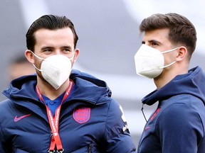 England's Ben Chilwell, left, and Mason Mount are isolating after coming into close contact with Billy Gilmour of Scotland who tested positive for COVID-19 following the Euro 2020 match between England and Scotland at Wembley Stadium in London on Friday, June 18, 2021.