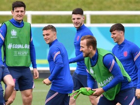 England's defender Harry Maguire, England's defender Kieran Trippier, England's midfielder Declan Rice, England's forward Harry Kane and England's midfielder Mason Mount take part in their MD-1 training session at St Georges Park in Burton-on-Trent, central England, on June 12, 2021 on the eve of their UEFA EURO 2020 match against Croatia.