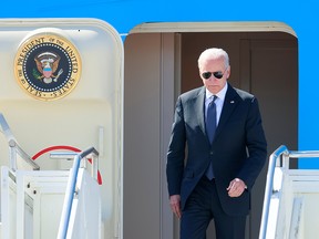 U.S. President Joe Biden steps off Air Force One at Cointrin airport as he arrives ahead of a meeting with Russian counterpart Vladimir Putin in Geneva, Switzerland, June 15, 2021.