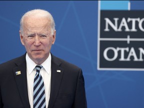 U.S. President Joe Biden arrives to be greeted and pose for a photograph with the NATO Secretary General during the NATO summit at the North Atlantic Treaty Organization (NATO) headquarters in Brussels on June 14, 2021.
