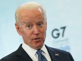 U.S. President Joe Biden reacts during a news conference at the end of the G7 summit, at Cornwall Airport Newquay, Britain, June 13, 2021.