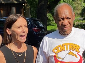 Attorney Jennifer Bonjean and Bill Cosby speak outside of Bill Cosby's home on June 30, 2021 in Cheltenham, Pa.