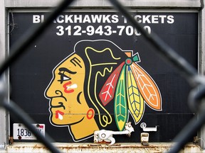 Blackhawk's ticket information and team logo are seen on the back of a truck through a fence outside of the United Center, the home of the Chicago Blackhawks, Feb. 16, 2005 in Chicago.