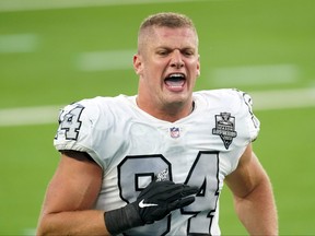 Las Vegas Raiders defensive end Carl Nassib celebrates at the end of the game against the Los Angeles Chargers at SoFi Stadium in Inglewood, Calif., Nov. 8, 2020.