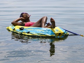 Anika McKenzie spends her time on Lake Ontario as a heatwave hits southern Ontario on Tuesday June 29, 2021. Veronica Henri/Toronto Sun/Postmedia Network