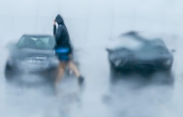 Thunderstorms and heavy rain has some shoppers running for cover in Ajax Ontario on Tuesday June 29, 2021. Veronica Henri/Toronto Sun/Postmedia Network