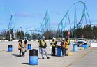 Health-care workers get ready to take patients at a drive-thru COVID-19 mass vaccination site at Canada's Wonderland during the COVID-19 pandemic in Vaughan March 29, 2021.  