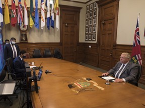 Ontario Premier Doug Ford participates in a press conference remotely from Queen's Park regarding Residential School burial sites in Toronto on Tuesday, June 15, 2021.