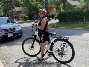Toronto Sun columnist Sue-Ann Levy is pictured with her new e-bike