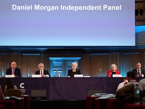 Panel members Michael Kellett, Rodney Morgan, Baroness Nuala O'Loan, Silvia Casale and Samuel Pollock prepare to read out a statement following the publication of the Daniel Morgan Independent Panel report, at Church House, in London, Britain, June 15, 2021.