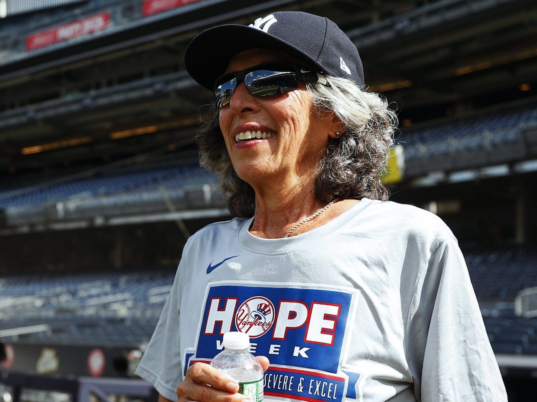 70-year-old woman gets to be NY Yankees' bat girl, throw out first pitch 