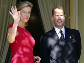 Prince Edward and his wife Sophie Rhys-Jones wave to the media after a photo op at Rideau Hall during their working visit to Canada.