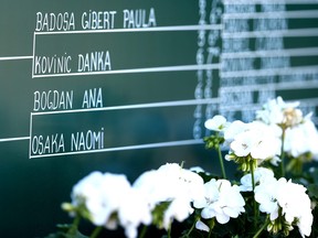 A detailed view of Naomi Osaka's name on the draw board inside the grounds during day three of the 2021 French Open at Roland Garros on June 1, 2021 in Paris.