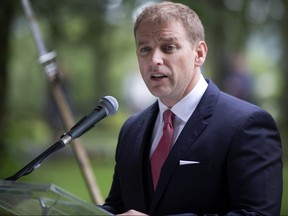 Premier of Newfoundland and Labrador Dr. Andrew Furey addresses the audience following the swearing-in ceremony on the grounds of Government House in St. John's on August 19, 2020.