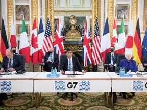 Britain's Chancellor of the Exchequer Rishi Sunak speaks at a meeting of finance ministers from across the G7 nations ahead of the G7 leaders' summit, at Lancaster House in London, June 4, 2021.
