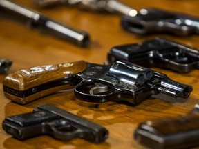 The parliamentary budget officer says it could cost $756 million to buy back guns now prohibited in Canada.